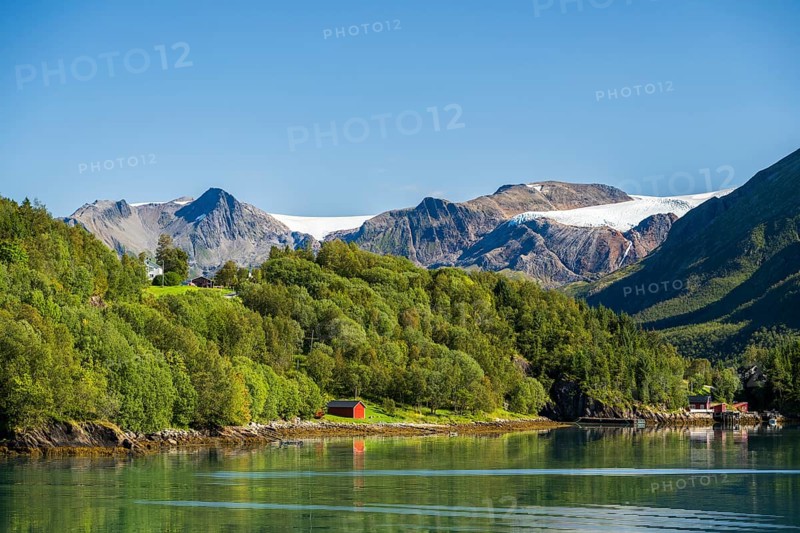Fjord shore with mountains and Svartisen glacier, Helgeland coast, Nordland, Norway, Europe