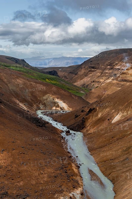 Stream between colourful rhyolite mountains, Hveradalir geothermal area, Kerlingarfjöll, Icelandic highlands, Iceland, Europe