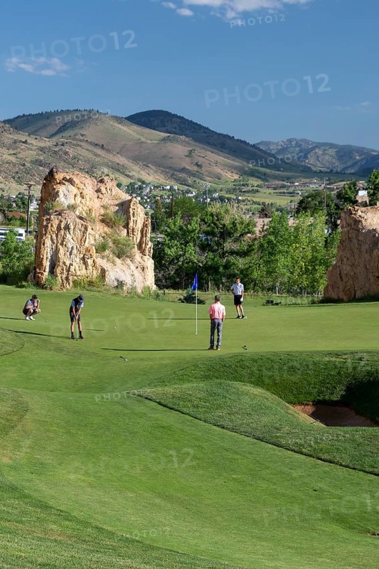 Golden, Colorado, The Fossil Trace Golf Course. Golfers play near footprints of dinosaurs and traces of other animals and plants from the Late Cretaceous period. The fossils were found on the large sandstone fins after clay was mined from between them. Visitors can walk the adjacent Triceratops Trail to view the fossils