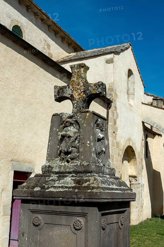 Artonne. Cross stone in front of Saint Martin church. Puy de Dome department. Auvergne Rhone Alpes. France