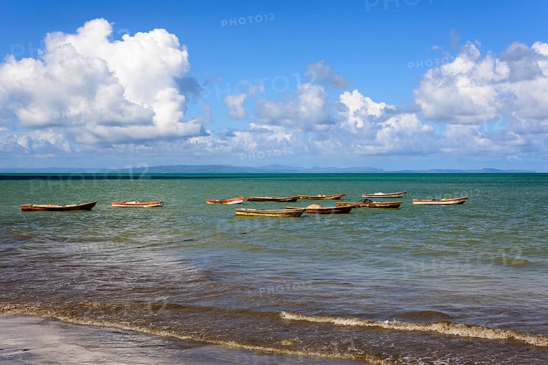 Calm sea with several small boats, fishing boats, blue sky with clouds above, Miches, El Seibo, Dominican Republic, Hispaniola, Caribbean, America, Central America