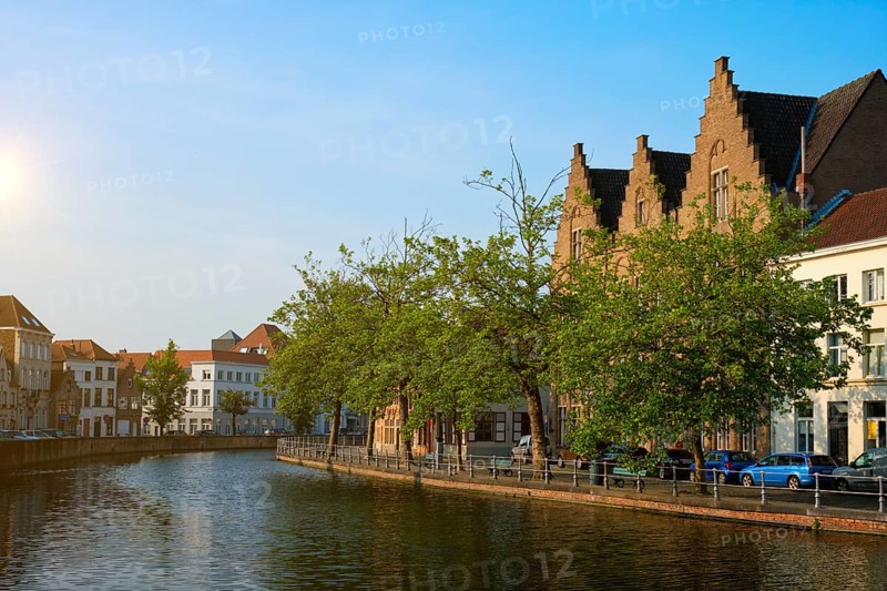 Typical Belgian cityscape Europe tourism concept, canal and old houses on sunset. Bruges (Brugge), Belgium, Europe