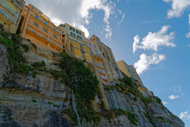 Colourful house facade of the medieval old town of Tropea, Tropea, Vibo Valentia, Calabria, Southern Italy, Italy, on sandstone rocks, Europe