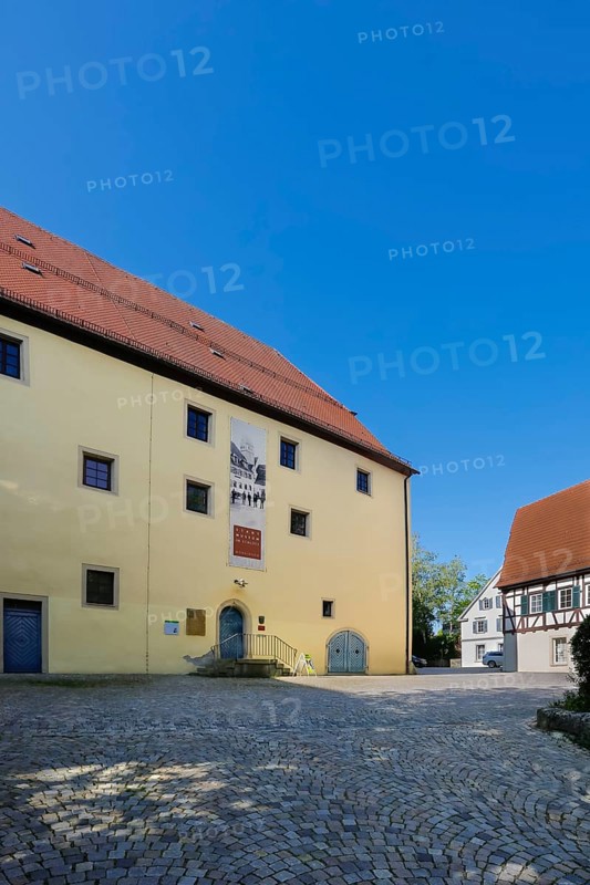 Ensemble of buildings at Münsingen Castle, on the left Old Castle, fruit cellar, town castle built around 1485 by the counts of Württemberg, today Münsingen Town Museum, on the right today's vehicle registration office, roof tiles, windows, half-timbering, shutters, historic buildings, architecture, castle courtyard, Münsingen, Swabian Alb, Baden-Württemberg, Germany, Europe