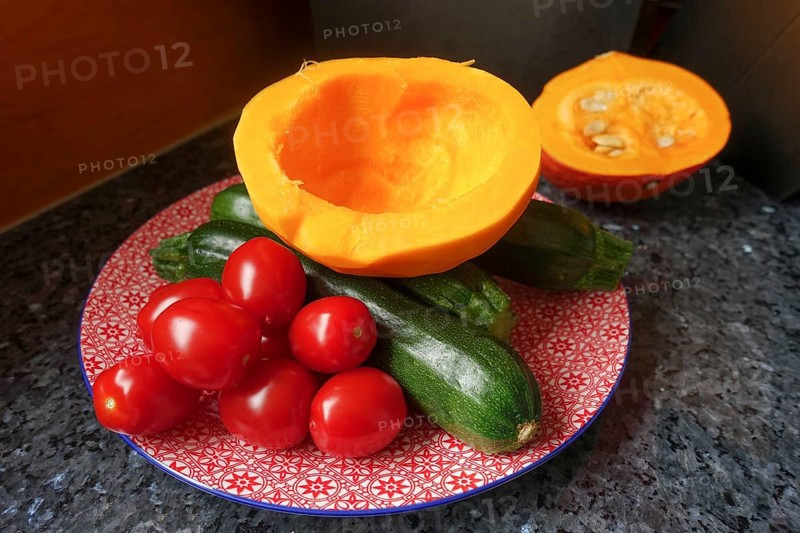 Swabian cuisine, preparation of vegetable mini dinettes, tomatoes, courgettes and pumpkin on plates, healthy, vegetarian, typical Swabian reinterpreted, traditional cuisine, food photography, studio, Germany, Europe