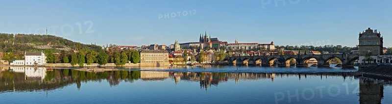 Panorama view of Charles bridge over Vltava river and Gradchany (Prague Castle) and St. Vitus Cathedral in the morning, Prague, Czech Republic, Europe