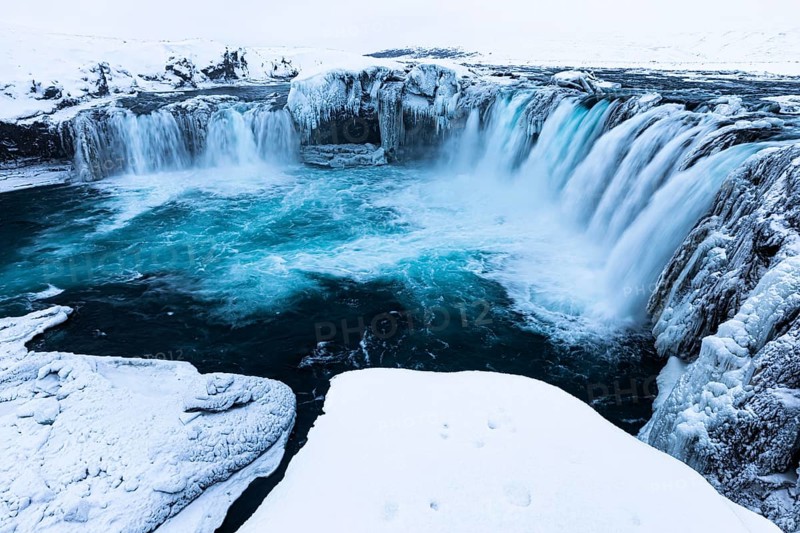 Godafoss waterfall, icy and snowy rock face, Northern Iceland Eyestra, Iceland, Europe