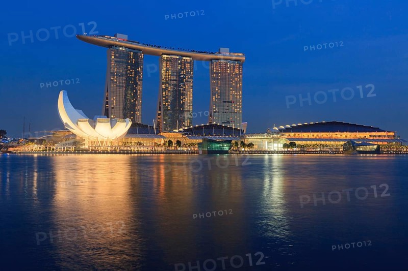 SINGAPORE, MAY 6: The Marina Bay Sands complex on sunset on May 6, 2011 in Singapore. Marina Bay Sands is an integrated resort and billed as the world's most expensive standalone casino property