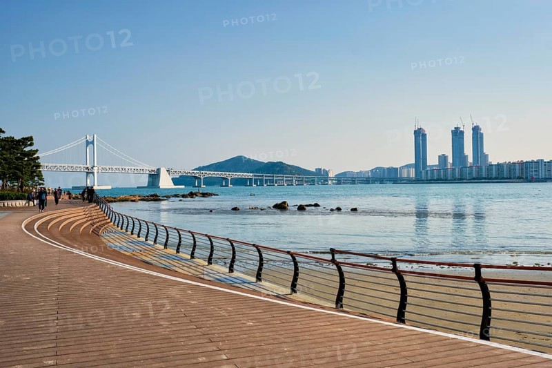 BUSAN, SOUTH KOREA, APRIL 11, 2017: Busan city beach promenade, skyscrapers and Gwangan Bridge, South Korea, Asia