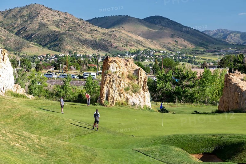 Golden, Colorado, The Fossil Trace Golf Course. Golfers play near footprints of dinosaurs and traces of other animals and plants from the Late Cretaceous period. The fossils were found on the large sandstone fins after clay was mined from between them. Visitors can walk the adjacent Triceratops Trail to view the fossils