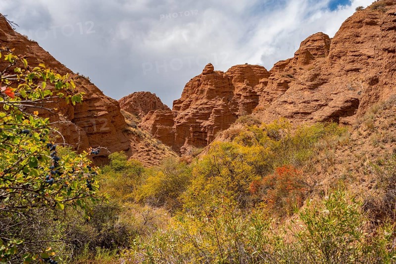 Eroded mountain landscape with sandstone cliffs, canyon with red and orange rock formations, Konorchek Canyon, Chuy, Kyrgyzstan, Asia