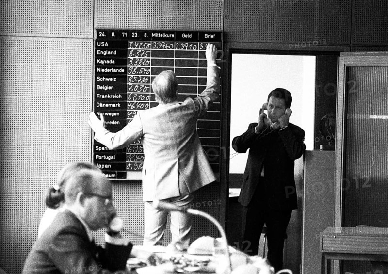 Trading in international currencies is the business of the foreign exchange market, here on 24.8.1971 in Düsseldorf, Germany, Europe
