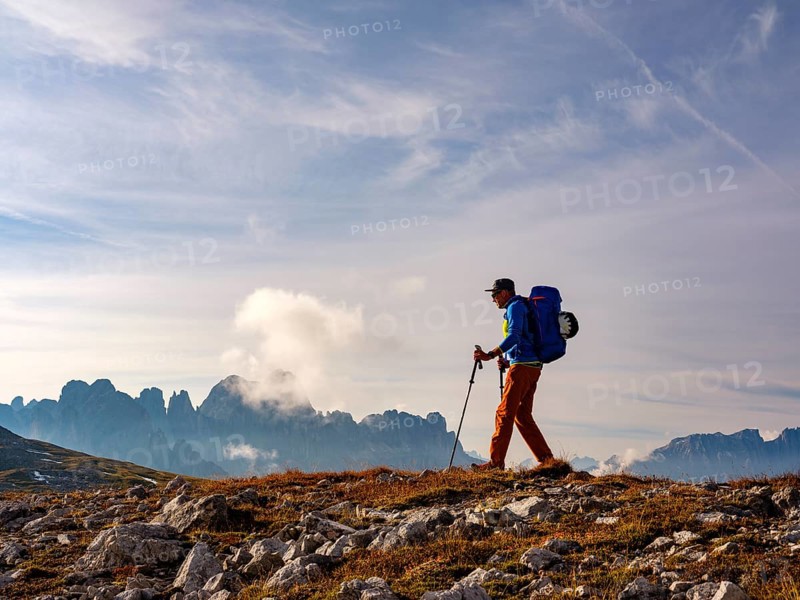Mountaineer on the Dolomites High Route 8, behind rose garden, Schlern, Dolomites, South Tyrol, Italy, Europe