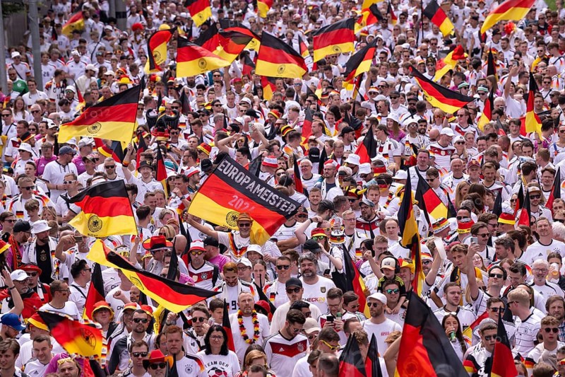 Fan march, German football fans march to the quarter-final Spain versus Germany, UEFA EURO 2024, European Championship, flags, flags, European champions, sea of flags, atmosphere, atmospheric, fan club DFB, German Football Association, B14, Cannstatter Straße, Stuttgart, Baden-Württemberg, Germany, Europe