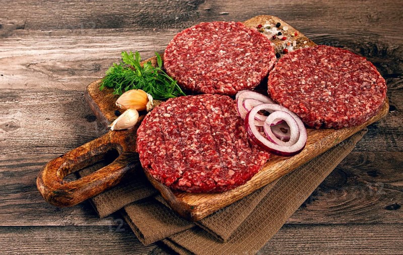 Raw cutlets, for burgers, minced meat, handmade, homemade, with spices, top view, no people