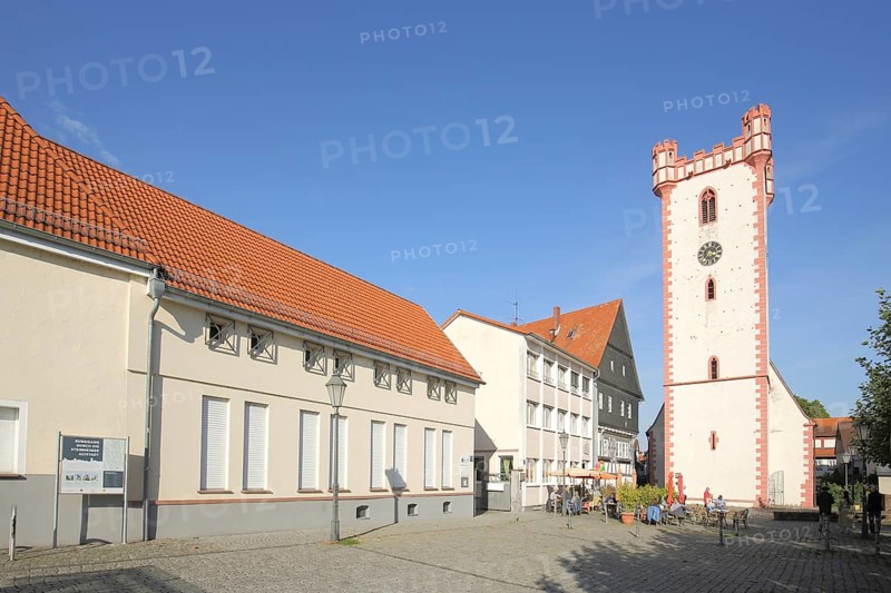 Historic fortified defence tower in front of St. Johann Baptist Church, Kardinal Volk Platz, Steinheim, Hanau, Hesse, Germany, Europe