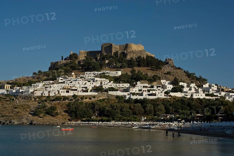 Rhodes Island, Lindos, Lindos is a town on the Greek island of Rhodes. Its landmark is the acropolis on a rock with huge archways from the 4th century and reliefs dating from around 280 BC