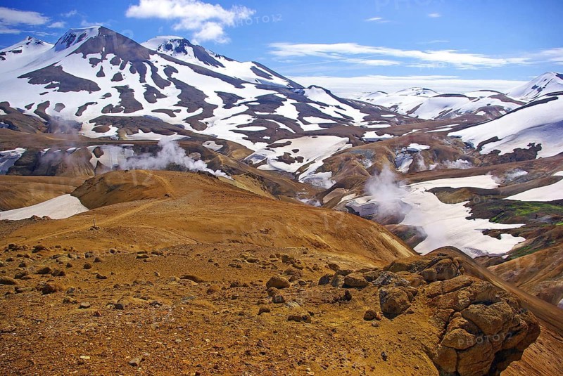 Snow-covered, volcanic landscapes, smoke and vapour drift over brown surfaces, highlands, fire and ice, Kerlingarfjell, Iceland, Europe