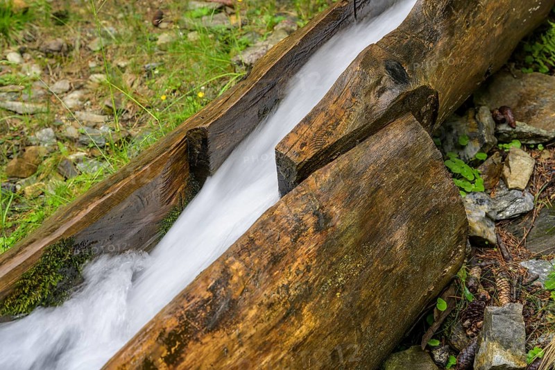 Detail of the wooden channel of the Kandelwaal, Martell, South Tyrol, Italy, Europe