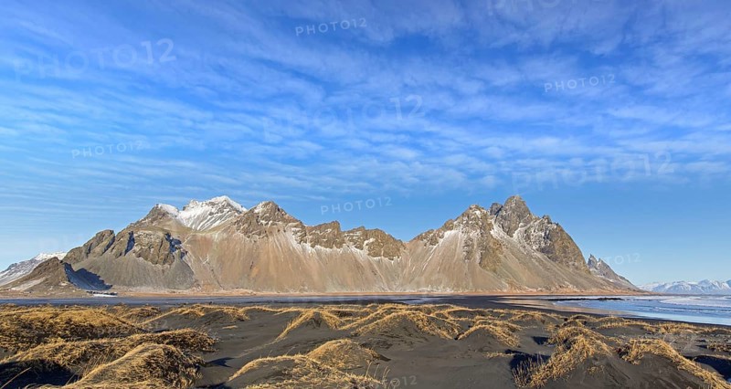 Vestrahorn, Vesturhorn, scree mountain made of gabbro and granophyre rocks, part of the Klifatindur mountain range at Stokksnes in winter, Iceland, Europe