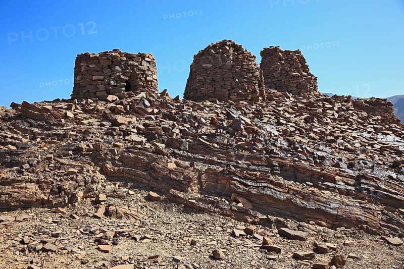 The beehive tombs of Al-Ayn are the most famous tombs in the area between the towns of Bat and Al-Ayn in the Hajar Mountains of Oman because of their good state of preservation and location on the edge of Jebel Misht (Ridge Mountain) . The tombs were inscribed on the Unesco World Heritage List in 1988
