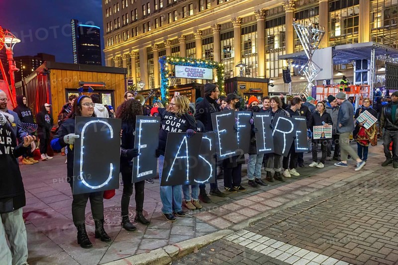 Detroit, Michigan USA, 7 December 2023, On the first night of Hanukkah, Jews for Ceasefire visited a mainstream menorah-lighting celebration to call for a ceasefire in Gaza