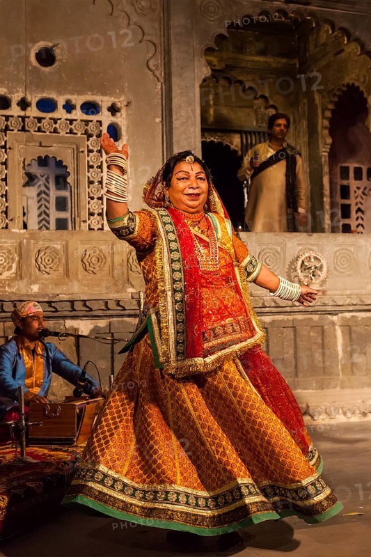 UDAIPUR, INDIA, NOVEMBER 24: Bhavai performance, famous folk dance of Rajasthan state of India. Performer balances number of earthen pots as she dance. November 24, 2012 in Udaipur, Rajasthan, India, Asia