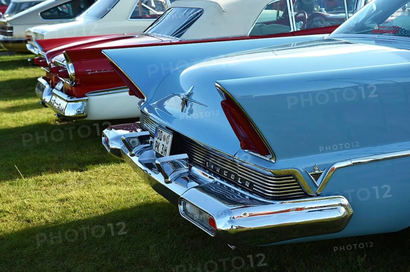 Rear view, Lincoln Premiere, and Ford Fairlane 500, Skyliner, at a classic car meeting in Büsum, Germany, Europe
