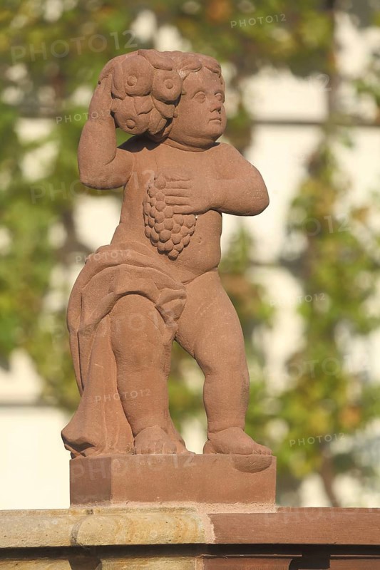 Red stone putto with grapes, detail, monastery complex, Seligenstadt, Main, Hesse, Germany, Europe