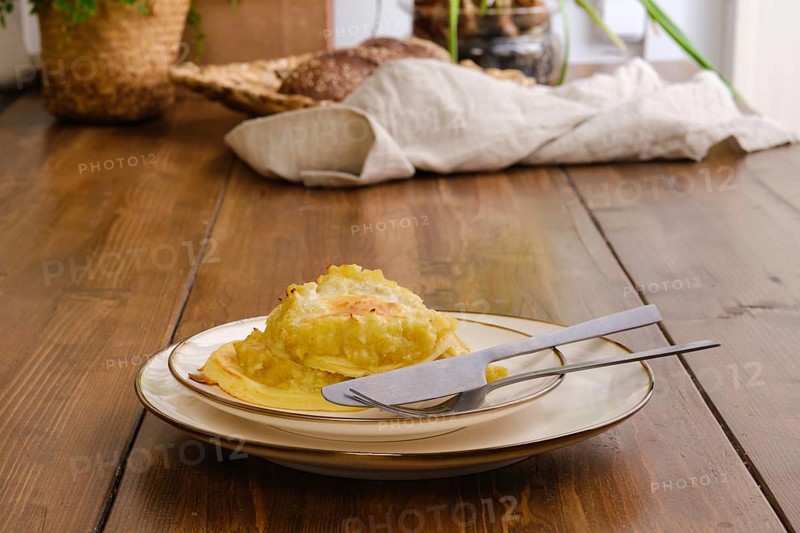 Portion of fried sweet apple pancakes on a plate