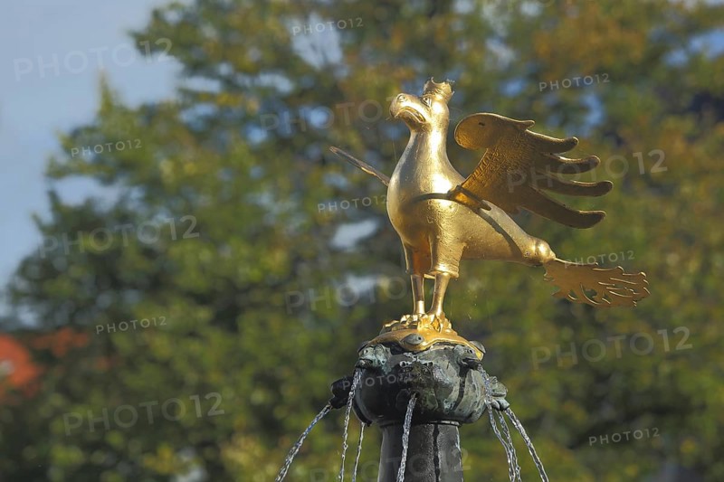 Golden heraldic animal with crown from the market fountain, eagle figure, golden, market place, detail, Goslar, Harz, Lower Saxony, Germany, Europe