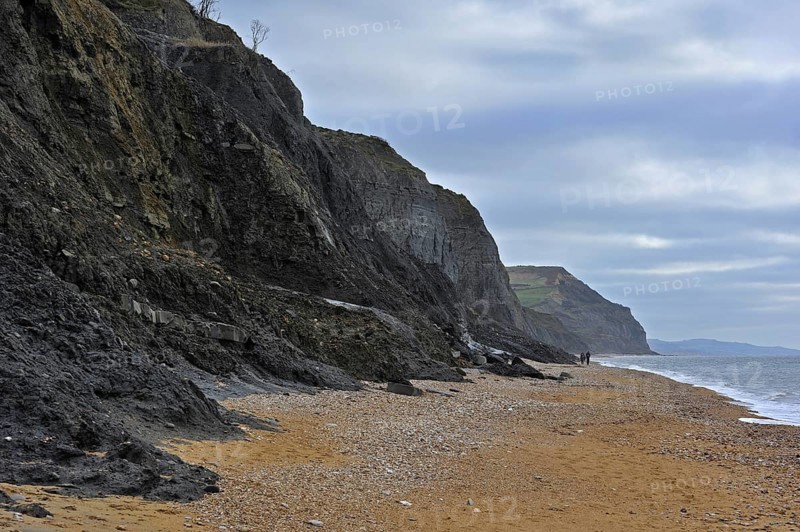 Black Ven landslide on beach between Lyme Regis and Charmouth along the Jurassic Coast, Dorset, southern England, UK