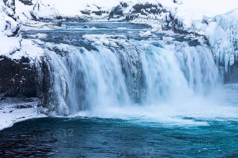 Godafoss waterfall, icy and snowy rock face, Northern Iceland Eyestra, Iceland, Europe