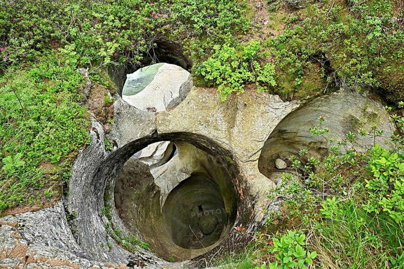 Glacier mills in the Cavaglia glacier garden, Poschiavo, Puschlav, Canton Graubünden, Switzerland, Europe