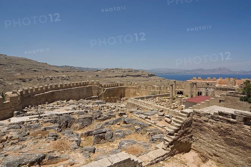 Rhodes Island, Lindos, Lindos is a town on the Greek island of Rhodes. Its landmark is the acropolis on a rock with huge archways from the 4th century and reliefs dating from around 280 BC. Ruins