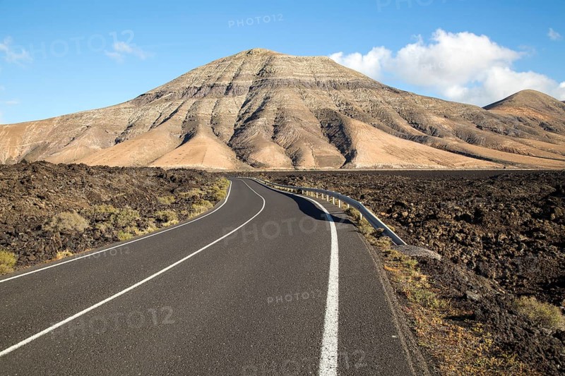 Road leading towards Montana de Medio, mountain, Los Ajaches mountain range, Lanzarote, Canary Islands, Spain, Europe