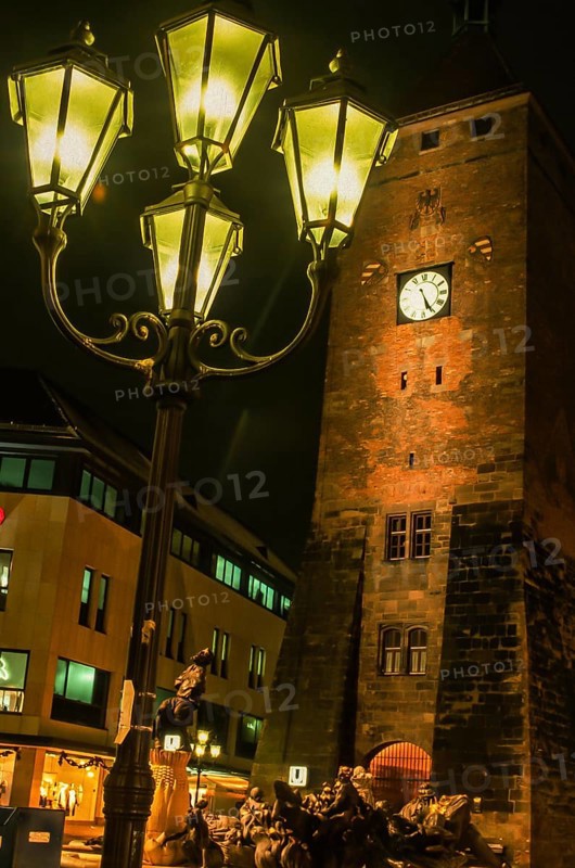 Nuremberg, White Tower illuminated by streetlights at night, Bavaria, Germany, Europe