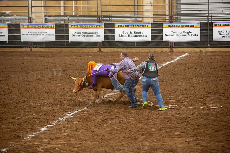 Oklahoma City, Oklahoma, The Great Plains Rodeo, an annual gay rodeo that features traditional rodeo competition while emphasizing the camaraderie of the LGBTQ community. In Wild Drag Racing three people must pull a steer across a while line and then the competitor in drag must ride it back across the line