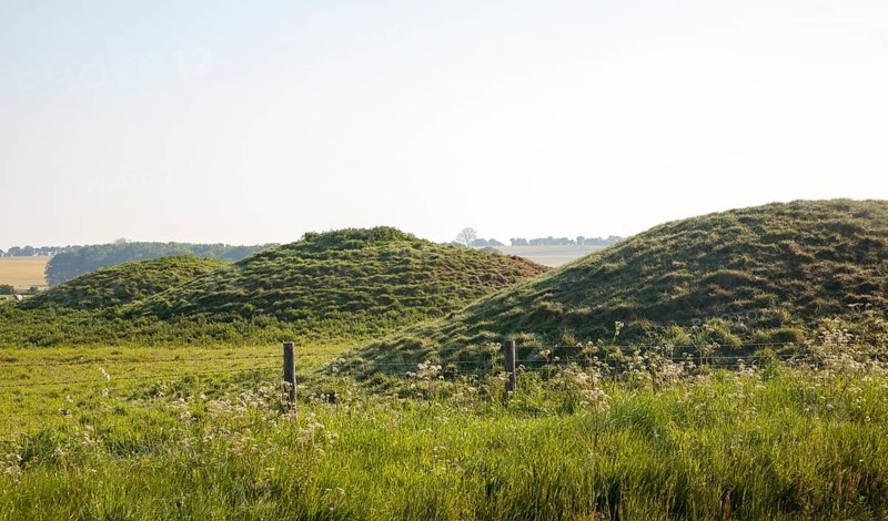 Tumuli megalithic burial mounds on the ancient Ridgeway, East Kennett, Wiltshire, England, United Kingdom, Europe
