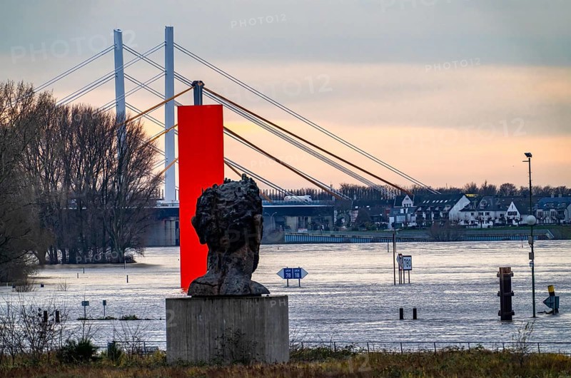 Flood on the Rhine near Duisburg, Rhine bridge Neuenkamp, old and new construction, landmark Rhine orange, washed by the flood, sculpture The Echo of Poseidon, on Mercator Island, washed by the flood, North Rhine-Westphalia, Germany, Europe