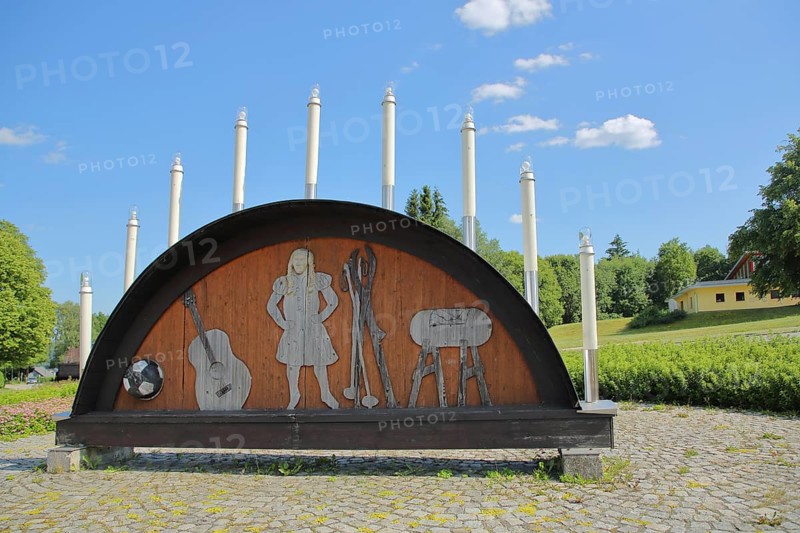 Traditional candle arch with lights as a symbol of historical manufacture and production of musical instruments and embroidery of textiles by bobbin lace making, Johanngeorgenstadt, Westerzgebirge, Erzgebirge, Saxony, Germany, Europe