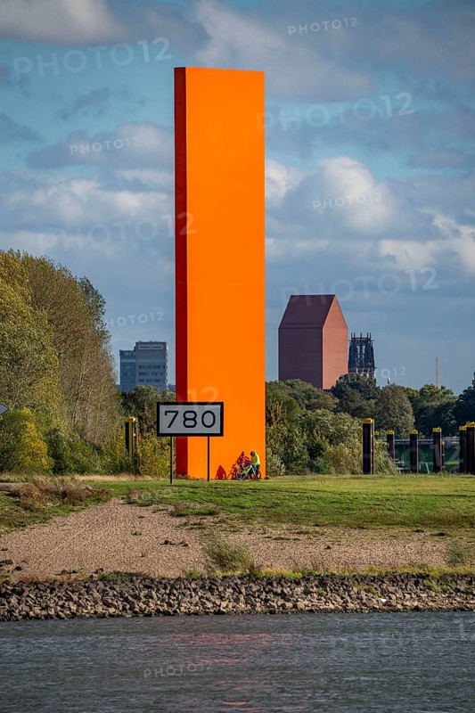 The sculpture Rhine Orange at the mouth of the Ruhr into the Rhine, skyline of the city centre of Duisburg, tower of the North Rhine-Westphalia State Archive, town hall tower and Salvator Church, North Rhine-Westphalia, Germany, Europe