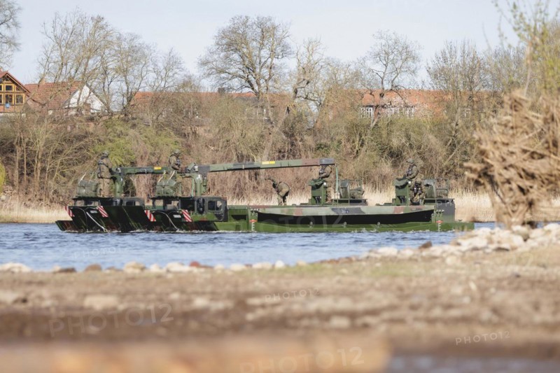 Amphibious vehicles of the type Amphibie M3 of the Bundeswehr taken during the military exercise 'Wettiner Schwert' near Tangermünde, 26.03.2024. 'Wettiner Schwert' is part of the Quadriga exercise of the Bundeswehr and the NATO large-scale manoeuvre Steadtfast Defender 2024