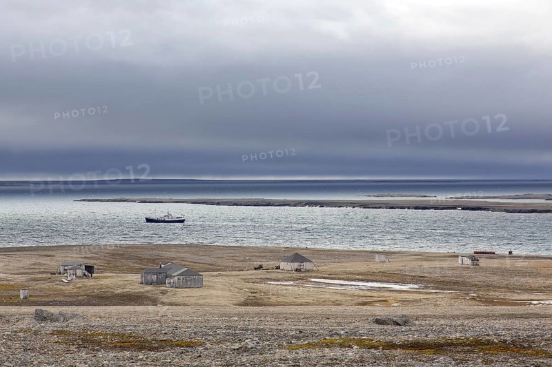 Wooden shacks and cabins at deserted 1950s Kinnvika Arctic research station, Murchisonfjord, Nordaustlandet, Svalbard, Spitsbergen, Norway, Europe