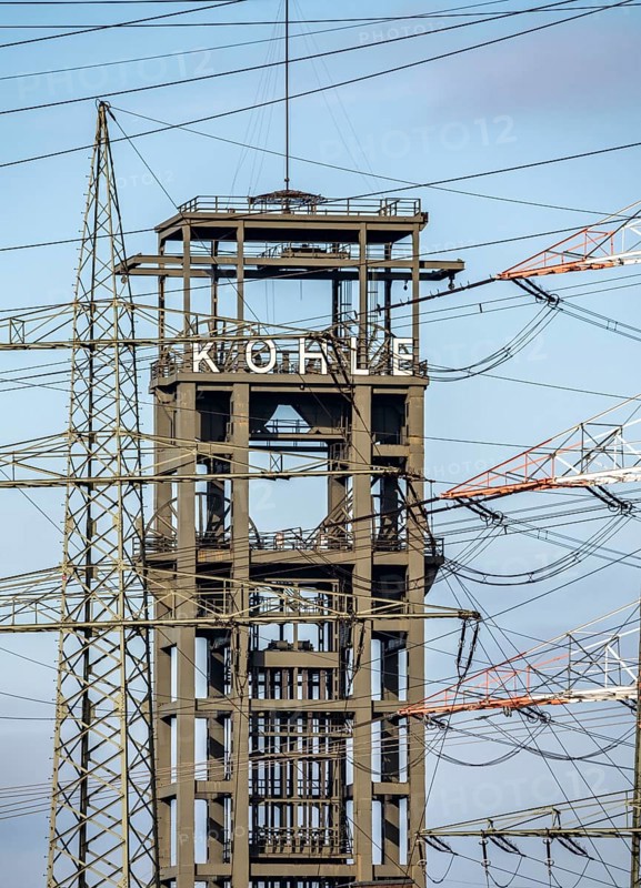 Headframe of the former, disused Walsum colliery, electricity pylons of the STEAG coal-fired power station Duisburg Walsum, on the Rhine, Duisburg, North Rhine-Westphalia, Germany, Europe
