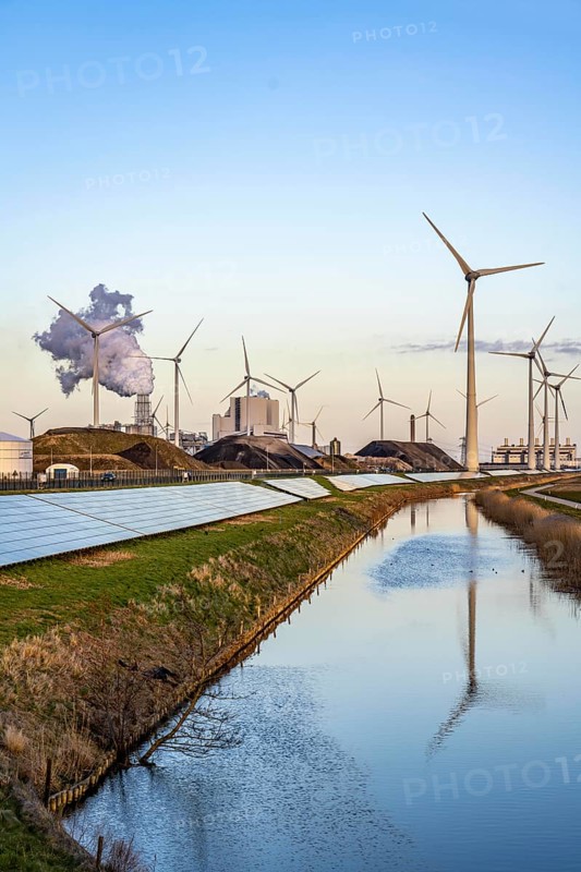 Solar park on the Slaperdijk dyke near the Eemshaven, test project, 17, 000 solar modules were installed over a good 5 kilometres, the Netherlands has over 22, 000 kilometres of dyke line, here it is being tested whether such an installation is successful and can be expanded, wind farm, behind the RWE coal-fired power plant Eemshavencentrale Groningen, Netherlands