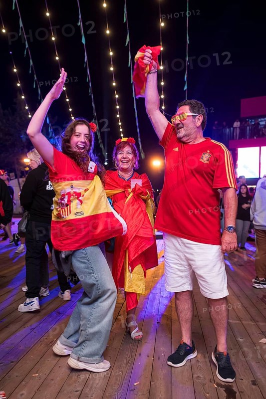 Fans of the Spanish football team at the Adidas fan zone at the Bundestag during the final match between Spain and England at the European Football Championship, Berlin, 14 July 2024