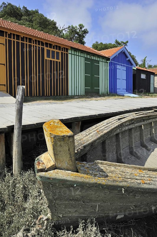 Colourful cabins of oyster farm at la Baudissière near Dolus, Saint-Pierre-d'Oléron on the island Ile d'Oléron, Charente-Maritime, France, Europe