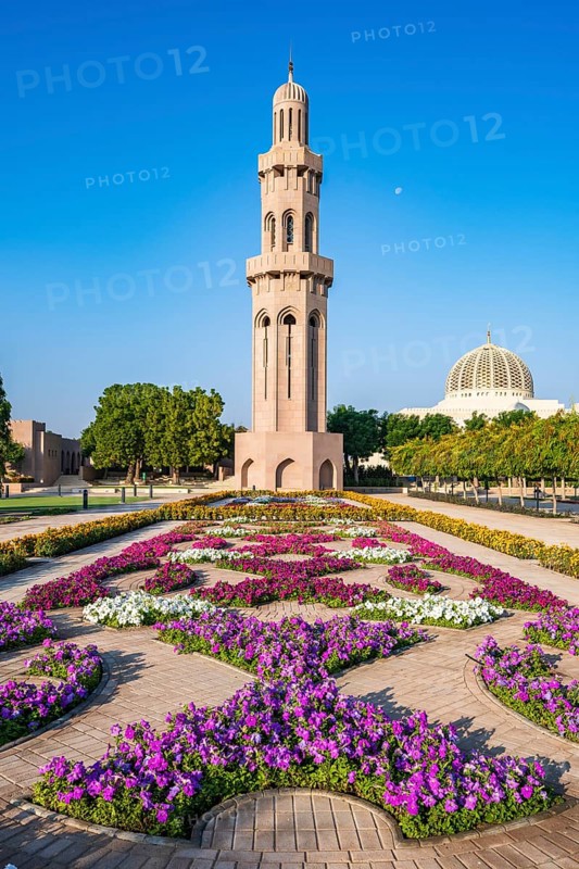 Sultan Qaboos Grand Mosque, minaret with blooming flowers in gardens, Muscat, Oman, Asia