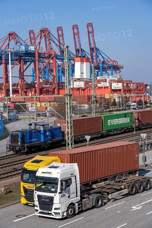 Port of Hamburg, Waltershofer Hafen, container ships, goods train with containers and container lorries bring and collect freight containers to and from HHLA Container Terminal Burchardkai, Hamburg, Germany, Europe